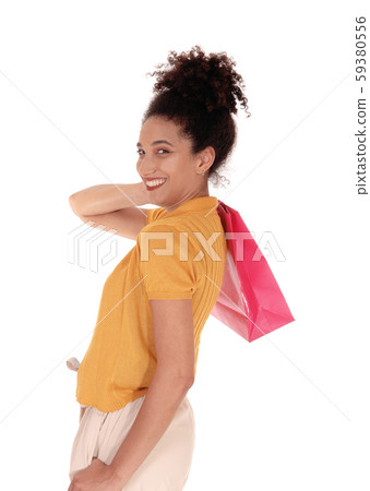 A happy multi-racial woman with her shopping bag 59380556
