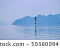 A small lighthouse in beautiful lake in a countryside Vietnam. Royalty high quality free stock image of nature landscape. A small lighthouse in beautiful lake in a countryside Vietnam. Royalty high quality free stock image of nature landscape. 59380994