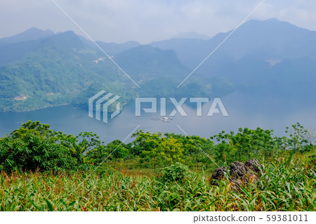 Beautiful landscape of lake in a countryside Vietnam. A view on top of mountain. Royalty high quality stock image of nature landscape. 59381011