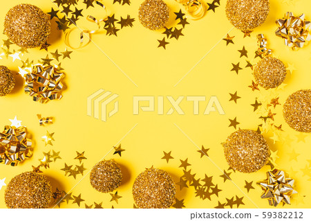 Christmas flat lay frame of golden baubles 59382212
