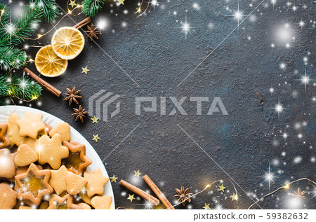 Christmas and culinary background with a plate of freshly baked Christmas gingerbread Christmas and culinary background with a plate of freshly baked Christmas gingerbread 59382632