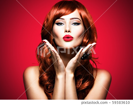 Beautiful sensual woman sends air kiss. Love. Beautiful sensual woman sends air kiss. Love. 59383610