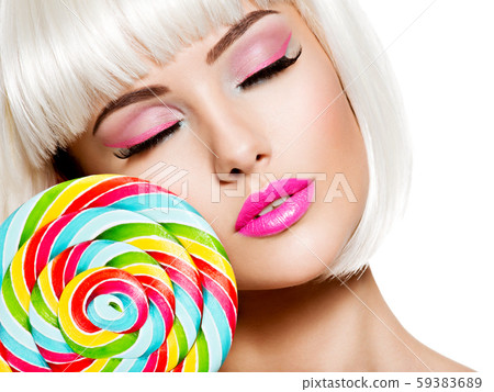 Face of a beautiful girl with pink make-up and Face of a beautiful girl with pink make-up and 59383689