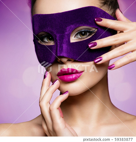 Portrait of a beautiful  woman with purple nails 59383877