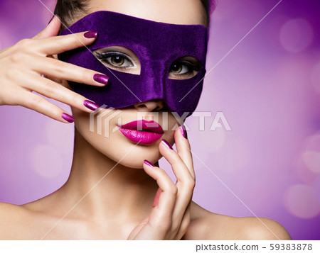 Portrait of a beautiful  woman with purple nails 59383878