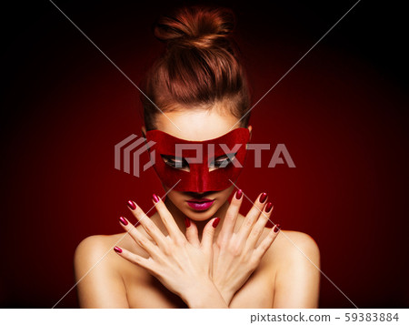 Beautiful  woman with red nails and red theatre 59383884
