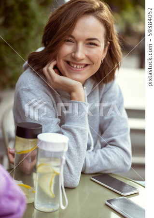 Close up of pleased girl that posing on camera 59384052