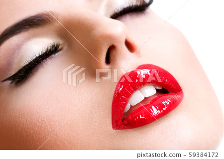 Closeup beautiful female lips with red lipstick. 59384172