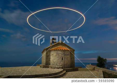 Saint Sava Church on Island Of Sveti Stefan with light-drawn circle at long exposure 59385090