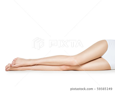 Woman legs isolated on white background Woman legs isolated on white background 59385149