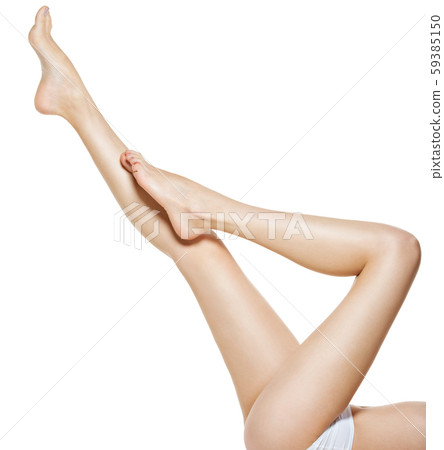 Beautiful female legs  isolated on white 59385150