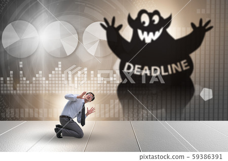 Businessman missing important deadline with monster 59386391
