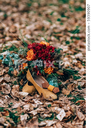 wedding attributes such as earrings, shoes, 59390907