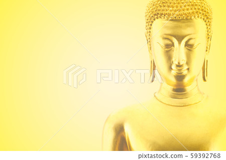 golden face of buddha statue on yellow background golden face of buddha statue on yellow background 59392768