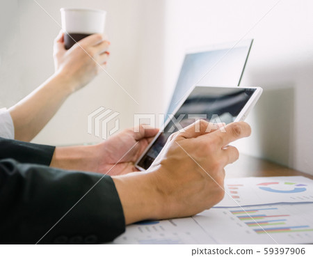 Business hand to computer Human work in the office on the desk Business hand to computer Human work in the office on the desk 59397906