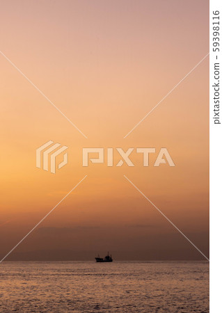 A ship at sunset A ship at sunset 59398116