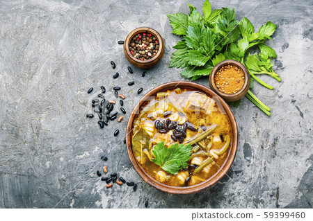 Bowl of delicious meat soup 59399460
