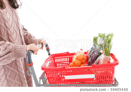 Young woman shopping for groceries 59405430