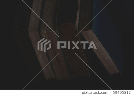 Old vintage books on dark background. 59405812