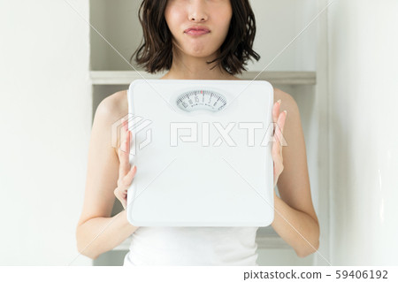 Diet, weight scale, women 59406192