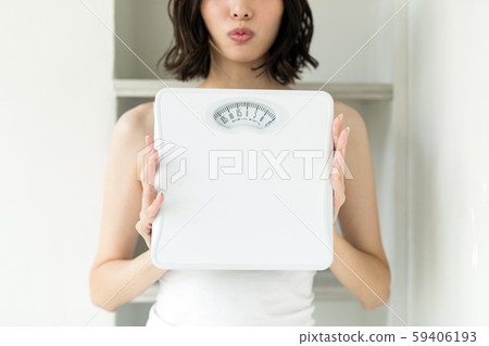 Diet, weight scale, women 59406193