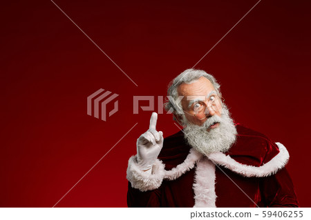 Surprised Santa Claus Pointing Up 59406255