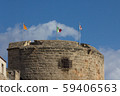 Torre di Porta Terra with three flags - catalan, italian and sar 59406563