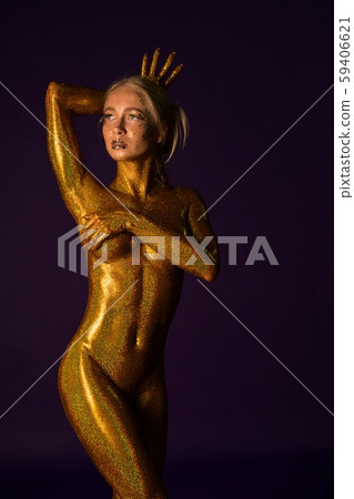 Nude girl with bodyart against purple background 59406621