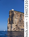View from the sea on Cape Capo Caccia near Alghero city of Sardi 59407230