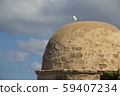 The fortress tower of old Alghero town bastion in Sardinia 59407234