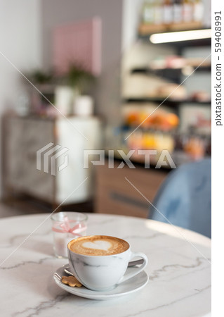 Cup of coffee with beautiful Latte art. Hot coffee in cafe, morning time. Food concept Cup of coffee with beautiful Latte art. Hot coffee in cafe, morning time. Food concept 59408991