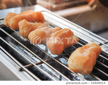 Deep-fried dough sticks (Youtiao or pathongko)  59409014