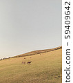 landscape in field with copy space. deer in a hill. Minimal view scenic with animal and mountain. vertical backgrounds. 59409642
