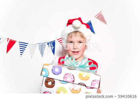 Little Santa helper hold a gift box Little Santa helper hold a gift box 59410616