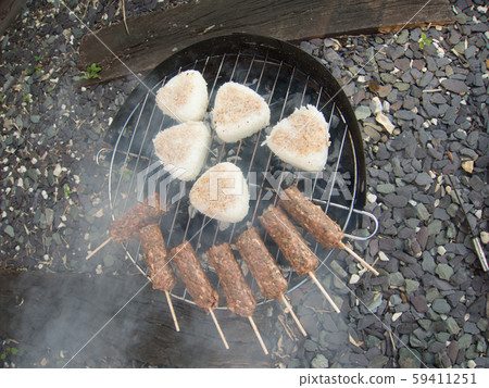 Barbecue grilled onigiri and skewered shish kebab Barbecue grilled onigiri and skewered shish kebab 59411251