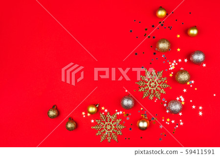 Festive red background with gold and silver stars and Christmas balls. Festive red background with gold and silver stars and Christmas balls. 59411591