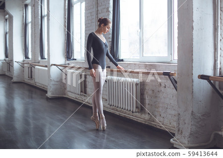 Young ballet dancer practice movement in studio active lifestyle 59413644