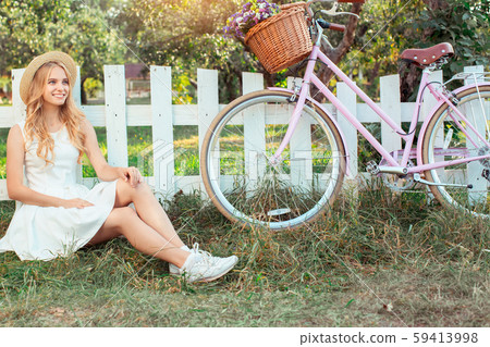 Young woman blonde hair summer style concept Young woman blonde hair summer style concept 59413998