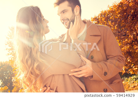 Young couple walk in the autumn park 59414929