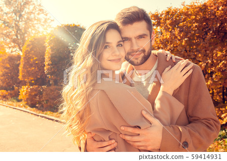 Young couple walk in the autumn park 59414931