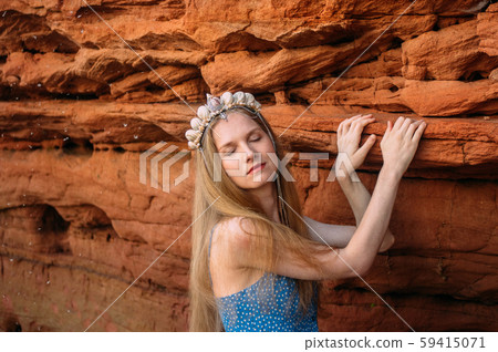 Young woman with closed eyes and threw back head Young woman with closed eyes and threw back head 59415071