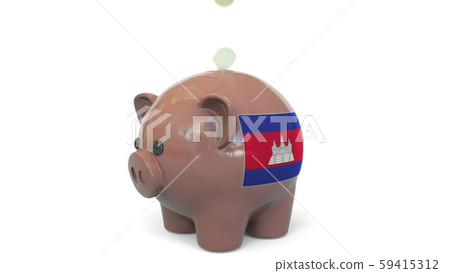 Putting money into piggy bank with flag of Cambodia. Tax system system or savings related conceptual 59415312