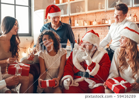 Group of friends party together indoors celebration 59416289