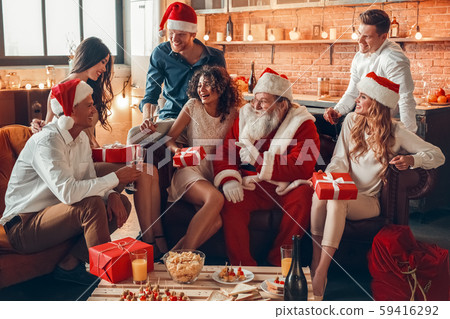 Group of friends party together indoors celebration Group of friends party together indoors celebration 59416292
