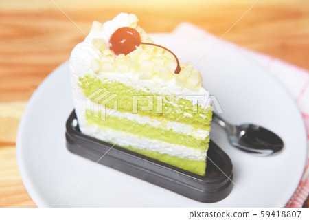 Delicious green tea cheese cake - Green cake slice Delicious green tea cheese cake - Green cake slice 59418807