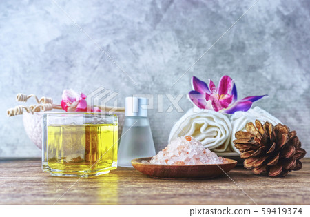 Himalaya salt and soap and towel on wood table Himalaya salt and soap and towel on wood table 59419374
