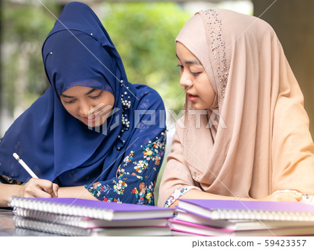 Muslim Student reading book Muslim Student reading book 59423357