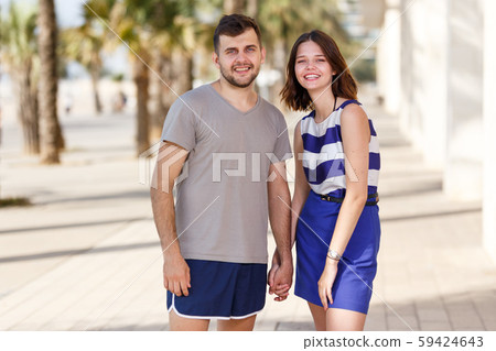 Man and girl standing and hugging Man and girl standing and hugging 59424643