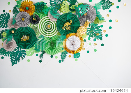 Green, emerald, gold and yellow papers circle shape of origami. Abstract background of paper designs 59424654
