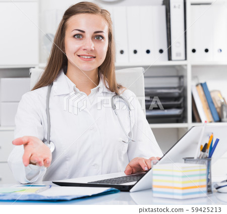 Female doctor is meeting next client 59425213